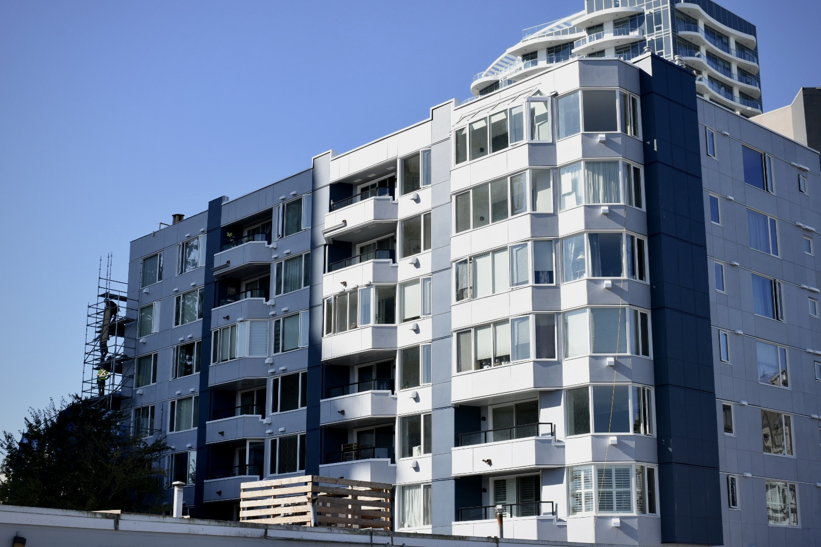 Pacific Terrace glazing upgrade with new aluminum curtain wall and storefront systems